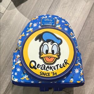 Loungefly Blue and Yellow Quacketeer Backpack